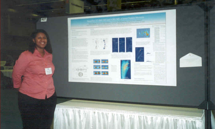 Reña Sowell (Robinson) presenting during a poster session. Reña Sowell (Robinson) presenting during a poster session.